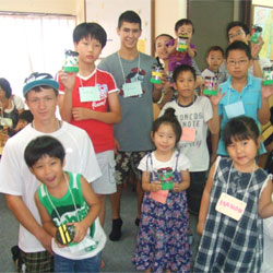 Sam helps run a VBS in Japan